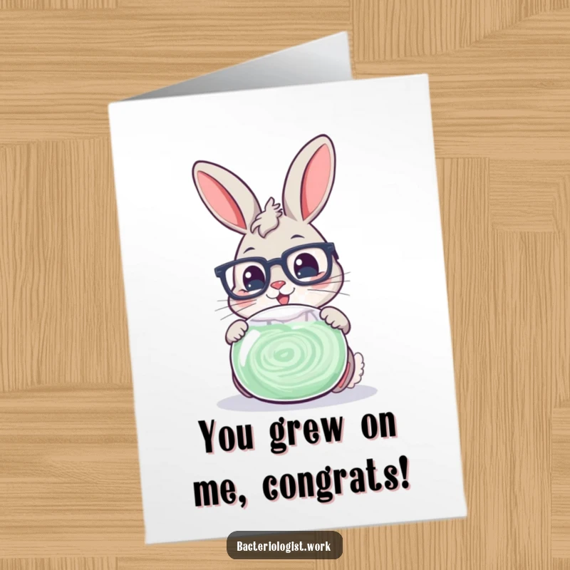 Funny Free Printable Congratulations Card: A bunny with glasses peers closely at a swirling petri dish, signifying a scientific breakthrough.